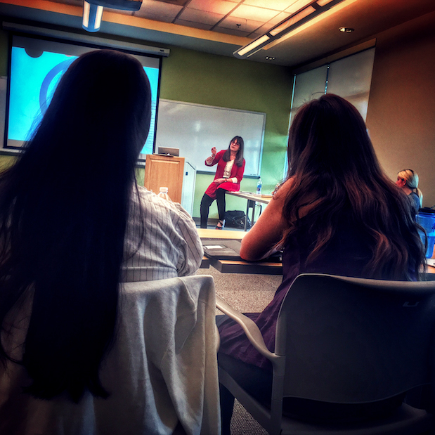 Dr. Constance Avery-Clark presenting to a classroom of therapists in training.